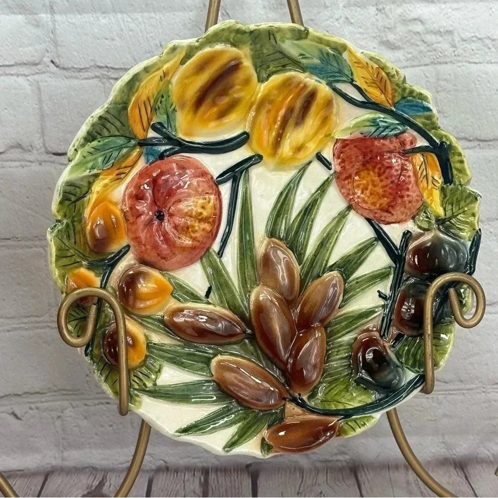 Vintage plate made in italy with olives figs Sicilian blood orange Quince fig